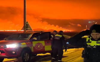 GRINDAVIK, ICELAND - DECEMBER 18: A volcano erupts on the Reykjanes Peninsula near the power station on December 18, 2023 north of Grindavik, Iceland. (Photo by Micah Garen/Getty Images)