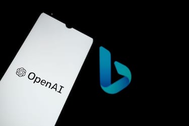 In this photo illustration an OpenAI logo seen displayed on a smartphone screen with a Bing logo in the background in Athens, Greece on February 8, 2023. (Photo Illustration by Nikolas Kokovlis/NurPhoto via Getty Images)