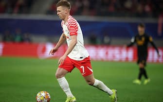 13 February 2024, Saxony, Leipzig: Soccer, Champions League, RB Leipzig - Real Madrid, knockout round, round of 16, first leg, at the Red Bull Arena. Leipzig's Dani Olmo on the ball. Photo: Jan Woitas/dpa