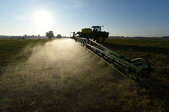A French farmer sprays glyphosate herbicide "Roundup 720" made by agrochemical giant Monsanto, at the rate of 720 grams per hectare, in Saint Germain-Sur- Sarthe, northwestern France, in a field of rye, peas, faba beans, triticals and Bird's-foot trefoil, sown in no-till vegetal cover, at sunrise on September 16, 2019. (Photo by JEAN-FRANCOIS MONIER / AFP) (Photo by JEAN-FRANCOIS MONIER/AFP via Getty Images)