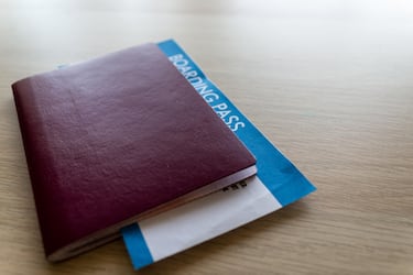 Travel concept. Passport and flight boarding pass ticket
