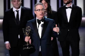 Jan 15, 2024; Los Angeles, CA, USA; John Oliver accepts the award for outstanding scripted variety series during the 75th Emmy Awards at the Peacock Theater in Los Angeles on Monday, Jan. 15, 2024. Mandatory Credit: Robert Hanashiro-USA TODAY/Sipa USA