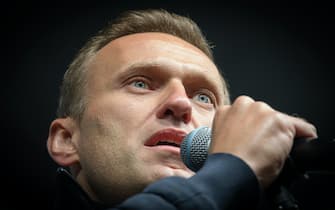 Russian opposition leader Alexei Navalny delivers a speech during a demonstration in Moscow on September 29, 2019. - Thousands gathered in Moscow for a demonstration demanding the release of the opposition protesters prosecuted in recent months. Police estimated a turnout of 20,000 people at the Sakharov Avenue in central Moscow about half an hour after the start of the protest, which was authorised. The demonstrators chanted "let them go" and brandished placards demanding a halt to "repressions" of opposition protesters. (Photo by Yuri KADOBNOV / AFP)        (Photo credit should read YURI KADOBNOV/AFP via Getty Images)