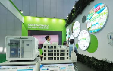 Visitors are visiting solar energy technology in buildings at the 2024 International Zero Carbon Cities, Villages, and Zero Carbon Buildings Conference in Beijing, China, on May 26, 2024. (Photo by Costfoto/NurPhoto via Getty Images)