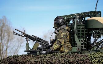 A Czech Army soldier takes part in the international military exercise "Wettiner Schwert 2024" (Wettin Sword 2024) in Hohengoehren, near Tangermunde, eastern Germany, on March 26, 2024. The NATO exercise "Wettiner Schwert 2024" is part of the "Quadriga 2024" exercise of the German armed forces Bundeswehr. (Photo by Ronny Hartmann / AFP)