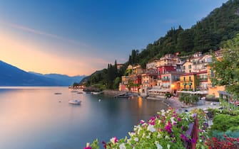 Sunset over the traditional village of Varenna on shore of Lake Como, Lecco province, Lombardy, Italy
