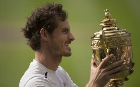 The Championships at Wimbledon DAY THIRTEEN Sunday 10th July 2016 Andy Murray (GBR) celebrates his mens final win against Milos Raonic (CAN) with the Trophy  

Material must be credited "The Times/News Syndication" unless otherwise agreed. 100% surcharge if not credited. Online rights need to be cleared separately. Strictly one time use only subject to agreement with News Syndication
