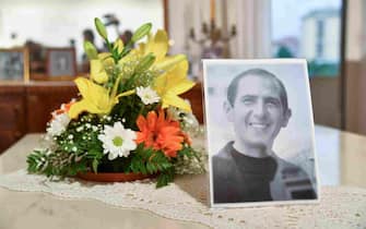 A photo of late priest Pino Puglisi is pictured in the historic house museum and "Padre Nostro" welcome center in the Brancaccio district of Palermo, Sicily, on September 14, 2018 on the eve of the Pope's visit to the Diocese. - Pope Francis is to pay a one-day pastoral visit on September 15 the Dioceses of Piazza Armerina and Palermo in Sicily, on the occasion of the 25th anniversary of the killing by the mafia of Sicilian priest Pino Puglisi. (Photo by Andreas SOLARO / AFP)        (Photo credit should read ANDREAS SOLARO/AFP via Getty Images)