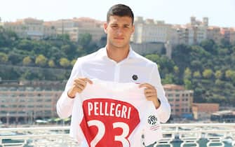 AS Monaco's Italian forward Pietro Pellegri  poses with his jersey during a presentation of the club's new players on August 20, 2018, at the Hotel Hermitage in Monaco. (Photo by VALERY HACHE / AFP)        (Photo credit should read VALERY HACHE/AFP/Getty Images)
