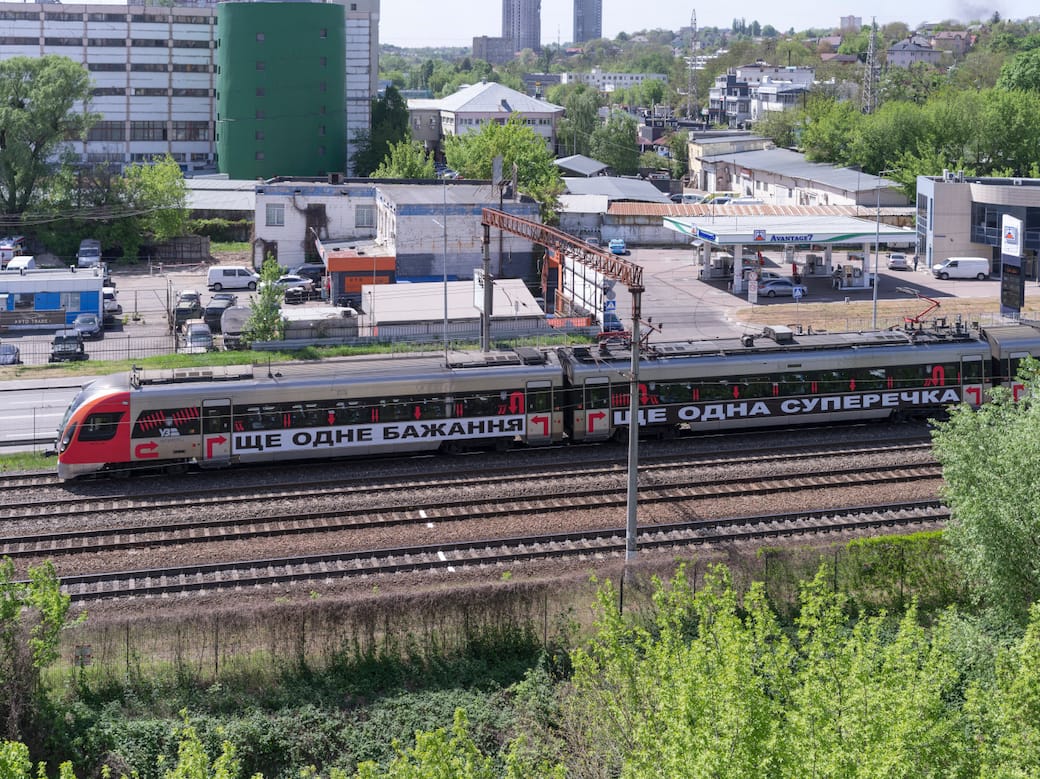 Barbara Kruger, Untitled (Another Again) 2025, Ukrainian Railways Intercity Train, Ukraine. Courtesy of the artist, RIBBON International, Ukrainian Railways, and Sprüth Magers. Photo: Vitalii Halanzha
