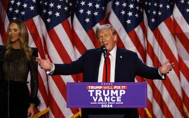 WEST PALM BEACH, FLORIDA - NOVEMBER 06: Republican presidential nominee, former U.S. President Donald Trump speaks during an election night event at the Palm Beach Convention Center on November 06, 2024 in West Palm Beach, Florida. Americans cast their ballots today in the presidential race between Republican nominee former President Donald Trump and Vice President Kamala Harris, as well as multiple state elections that will determine the balance of power in Congress. Joe Raedle/Getty Images/AFP (Photo by JOE RAEDLE / GETTY IMAGES NORTH AMERICA / Getty Images via AFP)