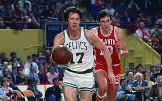 BOSTON - 1978:  John Havlicek #17 of the Boston Celtics moves the ball up court against Steve Hawes #10 of the Atlanta Hawks during a game played in 1978 at the Boston Garden in Boston, Massachusetts. NOTE TO USER: User expressly acknowledges and agrees that, by downloading and or using this photograph, User is consenting to the terms and conditions of the Getty Images License Agreement. Mandatory Copyright Notice: Copyright 1978 NBAE (Photo by Dick Raphael/NBAE via Getty Images)