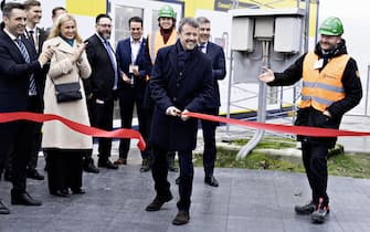 epa10997753 Danish Crown Prince Frederik (C) cuts a ribbon at the inauguration of Aalborg Portland's pilot plant for CO2 capture in Aalborg, Denmark, 27 November 2023, with the participation of EU Energy Commissioner Kadri Simson (2-L) and Danish Minister for Climate, Energy and Supply Lars Aagaard (C-R).  EPA/Henning Bagger DENMARK OUT