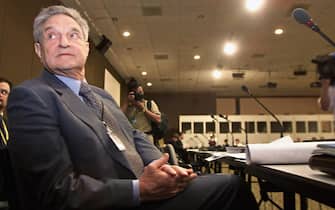 MONTERREY, MEXICO:  The well known businessman Georges Soros sits during his speech during the International Business Conference 18 March 2002 at the International Conference on Financing for Development of the United Nations in Monterrey, northern Mexico. AFP PHOTO/Jorge UZON (Photo credit should read JORGE UZON/AFP via Getty Images)