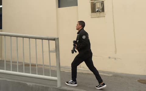 RIO DE JANEIRO, BRAZIL  OCTOBER 28: Security forces take measures following a large-scale police operation targeting the Comando Vermelho (CV) gang in the Alemao and Penha complexes in the northern zone of Rio de Janeiro, Brazil, on October 28, 2025. Authorities report that at least 64 people  including four police officers  were killed and 81 suspects were detained, marking the deadliest operation in the state's history. (Photo by Fabio Teixeira/Anadolu via Getty Images)