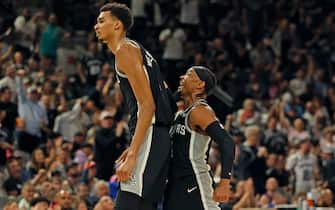 SAN ANTONIO, TX - APRIL 12: Victor Wembanyama #1 of the San Antonio Spurs celebrates with Devonte Graham #4 of the San Antonio Spurs after scoring a three against the Denver Nuggetsin the second half at Frost Bank Center on April 12, 2024 in San Antonio, Texas. NOTE TO USER: User expressly acknowledges and agrees that, by downloading and or using this photograph, User is consenting to terms and conditions of the Getty Images License Agreement. (Photo by Ronald Cortes/Getty Images)