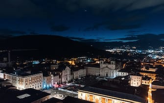 Planets Jupiter and Venus in conjunction are seen after sunset in an aerial drone view of Piazza Duomo square in LAquila, Italy, on march 1st, 2023. Planets seem to be very close (less than a degree away from each other). Moons (satellites) of Jupiter are visible even with a telephoto lens. (Photo by Lorenzo Di Cola/NurPhoto via Getty Images)