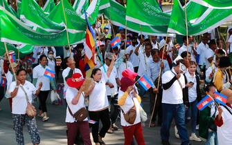 epa11311639 Cambodian workers gather during a rally in Phnom Penh, Cambodia, 01 May 2024. Workers and labor groups held a rally in the Cambodian capital to mark International Labor Day.  EPA/KITH SEREY