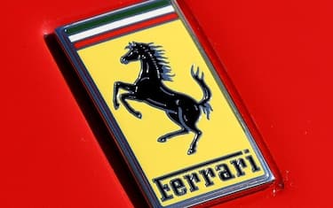epa06255679 The Ferrari symbol, the Cavallino Rampante (prancing horse) with Ferrari lettering, is seen on a LaFerrari Aperta hybrid sports car in Albert Park, the home of the Australian Grand Prix, in Melbourne, Victoria, Australia, 10 October 2017. More than 100 Ferrari cars have descended on the park as the Italian luxury sports car mark its 70th anniversary in Australia.  EPA/JOE CASTRO  AUSTRALIA AND NEW ZEALAND OUT
