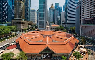 The Telok Ayer Market, also known as Lau Pa Sat, a popular food center stands among commercial buildings in the central business district of Singapore, on Friday, April 8, 2016. Singapore edged past Hong Kong as the worlds No. 3 financial center. The Southeast Asian city-state ranks behind London and New York on the Global Financial Centres Index, according to a survey by London-based research firm Z/Yen Group. Photographer: Sam Kang Li/Bloomberg via Getty Images