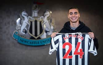 NEWCASTLE UPON TYNE, ENGLAND - JANUARY 30: New signing Miguel Almiron poses for photos holding a named and numbered shirt at St.James' Park on January 30, 2019 in Newcastle upon Tyne, England. (Photo by Serena Taylor/Newcastle United)