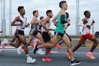 Runners cross the Verrazano Bridge before competing in the Men's division during the 52nd Edition of the New York City Marathon on November 5, 2023. (Photo by Kena Betancur / AFP) (Photo by KENA BETANCUR/AFP via Getty Images)