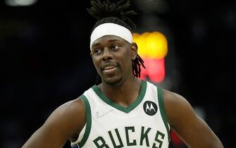 MILWAUKEE, WISCONSIN - APRIL 03: Jrue Holiday #21 of the Milwaukee Bucks looks on during the second half of the game against the Dallas Mavericks at Fiserv Forum on April 03, 2022 in Milwaukee, Wisconsin. NOTE TO USER: User expressly acknowledges and agrees that, by downloading and or using this photograph, User is consenting to the terms and conditions of the Getty Images License Agreement. (Photo by John Fisher/Getty Images)