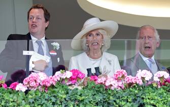 ASCOT, ENGLAND - JUNE 20: (L-R) Tom Parker Bowles, Queen Camilla and King Charles III watch a race during day one of Royal Ascot 2023 at Ascot Racecourse on June 20, 2023 in Ascot, England. (Photo by Chris Jackson/Getty Images)