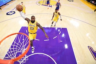 LOS ANGELES, CA - APRIL 25: LeBron James #23 of the Los Angeles Lakers drives to the basket during the game against the Denver Nuggets during Round One Game Three of the 2024 NBA Playoffs on April 25, 2024 at Crypto.Com Arena in Los Angeles, California. NOTE TO USER: User expressly acknowledges and agrees that, by downloading and/or using this Photograph, user is consenting to the terms and conditions of the Getty Images License Agreement. Mandatory Copyright Notice: Copyright 2024 NBAE (Photo by Adam Pantozzi/NBAE via Getty Images)