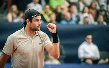 Italy's Matteo Berrettini reacts after winning a point during his final match at the Swiss Open tennis tournament against France's Quentin Halys, in Gstaad, on July 21, 2024. (Photo by GABRIEL MONNET / AFP)