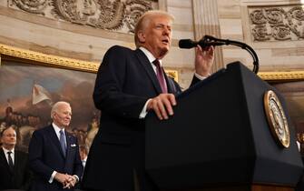 WASHINGTON, DC - JANUARY 20: U.S. President Donald Trump speaks as former U.S. President Joe Biden looks on during inauguration ceremonies in the Rotunda of the U.S. Capitol on January 20, 2025 in Washington, DC. Donald Trump takes office for his second term as the 47th president of the United States. (Photo by Chip Somodevilla/Getty Images)