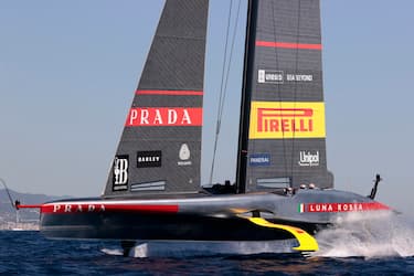 epa11605465 Italian vessel Luna Rossa competes during the second day of the the Louis Vuitton Cup Semi-Finals within the America's Cup sailing competition held in Barcelona, Spain, 15 September 2024.  EPA/Toni Albir