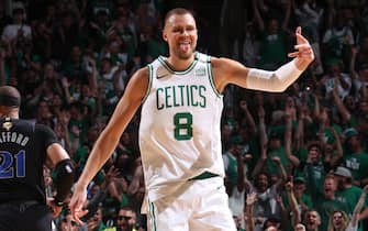 BOSTON, MA - JUNE 6: Kristaps Porzingis #8 of the Boston Celtics celebrates during the game against the Dallas Mavericks during Game 1 of the 2024 NBA Finals on June 6, 2024 at the TD Garden in Boston, Massachusetts. NOTE TO USER: User expressly acknowledges and agrees that, by downloading and or using this photograph, User is consenting to the terms and conditions of the Getty Images License Agreement. Mandatory Copyright Notice: Copyright 2024 NBAE  (Photo by Nathaniel S. Butler/NBAE via Getty Images)