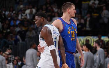 DENVER, CO - MARCH 29: Nikola Jokic #15 of the Denver Nuggets greets Anthony Edwards #5 of the Minnesota Timberwolves before the game on March 29, 2024 at the Ball Arena in Denver, Colorado. NOTE TO USER: User expressly acknowledges and agrees that, by downloading and/or using this Photograph, user is consenting to the terms and conditions of the Getty Images License Agreement. Mandatory Copyright Notice: Copyright 2024 NBAE (Photo by Bart Young/NBAE via Getty Images)