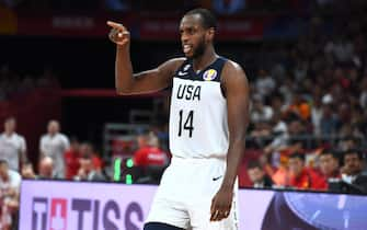 BEIJING, CHINA - SEPTEMBER 14: Khris Middleton #14 of Team USA looks on during the game against Team Poland during the 2019 FIBA World Cup Classification 7-8 at the Cadillac Arena on September 14, 2019 in Beijing, China.  NOTE TO USER: User expressly acknowledges and agrees that, by downloading and/or using this Photograph, user is consenting to the terms and conditions of the Getty Images License Agreement. Mandatory Copyright Notice: Copyright 2019 NBAE (Photo by Garrett W. Ellwood/NBAE via Getty Images)