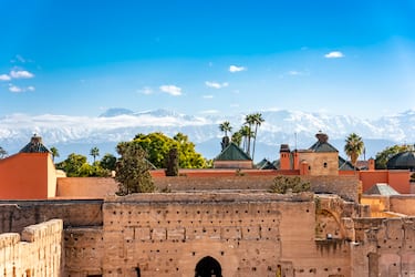 Morocco, Marrakesh-Safi, Marrakesh, Walls of El Badi Palace with mountains in background
