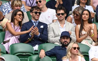 LONDON, ENGLAND - JULY 10: (L-R) Francisca Gomes, Pierre Gasly, Charles Leclerc and Alexandra Saint Mleux attend day eight of the Wimbledon Tennis Championships at All England Lawn Tennis and Croquet Club on July 10, 2023 in London, England. (Photo by Karwai Tang/WireImage)