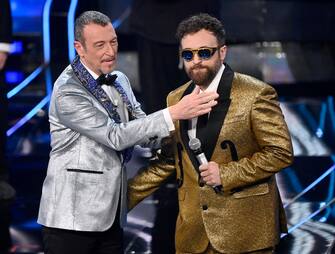 Sanremo Festival host and artistic director Amadeus (L) and Italian Dargen D'Amico on stage at the Ariston theatre during the 74th Sanremo Italian Song Festival, Sanremo, Italy, 09 February 2024. The music festival will run from 06 to 10 February 2024. ANSA/RICCARDO ANTIMIANI