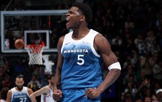 MINNEAPOLIS, MN -  NOVEMBER 28: Anthony Edwards #5 of the Minnesota Timberwolves celebrates during the game against the Oklahoma City Thunder during the In - Season Tournament on November 28, 2023 at Target Center in Minneapolis, Minnesota. NOTE TO USER: User expressly acknowledges and agrees that, by downloading and or using this Photograph, user is consenting to the terms and conditions of the Getty Images License Agreement. Mandatory Copyright Notice: Copyright 2023 NBAE (Photo by David Sherman/NBAE via Getty Images)