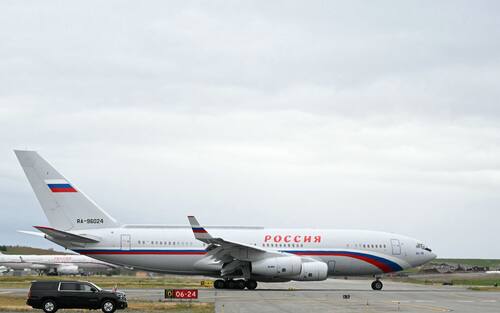 A plane carrying Russian President Vladimir Putin is seen after landing at Joint Base Elmendorf-Richardson in Anchorage, Alaska, on August 15, 2025. Putin is in Alaska at the invitation of US President Donald Trump in his first visit to a Western country since he ordered the 2022 invasion of Ukraine that has killed tens of thousands of people. (Photo by ANDREW CABALLERO-REYNOLDS / AFP)