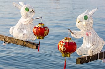 Ships with rabbit lantern decoration appear in the West Lake Scenic Area of Hangzhou City, east China's Zhejiang Province, 11 January, 2023. (Photo by ChinaImages/Sipa USA)