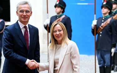 Italy's Prime Minister, Giorgia Meloni (R) welcomes NATO Secretary General Jens Stoltenberg at Palazzo Chigi prior their meeting in Rome on May 8, 2024. (Photo by Filippo MONTEFORTE / AFP)