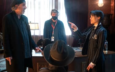 Wednesday. (L to R) Director Tim Burton, Jenna Ortega as Wednesday Addams in Wednesday. Cr. Tomasz Lazar/Netflix © 2022