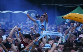 epa10684329 Manchester City fans react during the UEFA Champions League final between Manchester City and Inter Milan, at the 4TheFans fan park in Manchester, Britain, 10 June 2023.  EPA/ADAM VAUGHAN