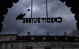 epa10532661 The cloud viewed through a logo of the Swiss bank Credit Suisse taken from behind, at the banks headquarters entrance at Paradeplatz in Zurich, Switzerland, 19 March 2023. Shares of Credit Suisse lost more than one-quarter of their value on 15 March 2023, hitting a record low after its biggest shareholder, the Saudi National Bank, told outlets that it would not inject more money into the ailing Swiss bank. Its shares recovered briefly on 16 March after Switzerland's central bank announced that it was to loan CS money but fears of turmoil in the global banking sector persist.  EPA/MICHAEL BUHOLZER