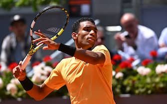 Felix Auger-Aliassime (CAN) during his first round match at the Mutua Madrid Open in Madrid , Spain, on April, 25, 2024. Photo by Corinne Dubreuil/ABACAPRESS.COM