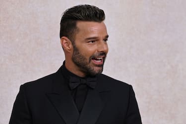 Puerto Rican singer actor Ricky Martin arrives on May 26, 2022 to attend the annual amfAR Cinema Against AIDS Cannes Gala at the Hotel du Cap-Eden-Roc in Cap d'Antibes, southern France, on the sidelines of the 75th Cannes Film Festival. (Photo by Stefano Rellandini / AFP) (Photo by STEFANO RELLANDINI/AFP via Getty Images)