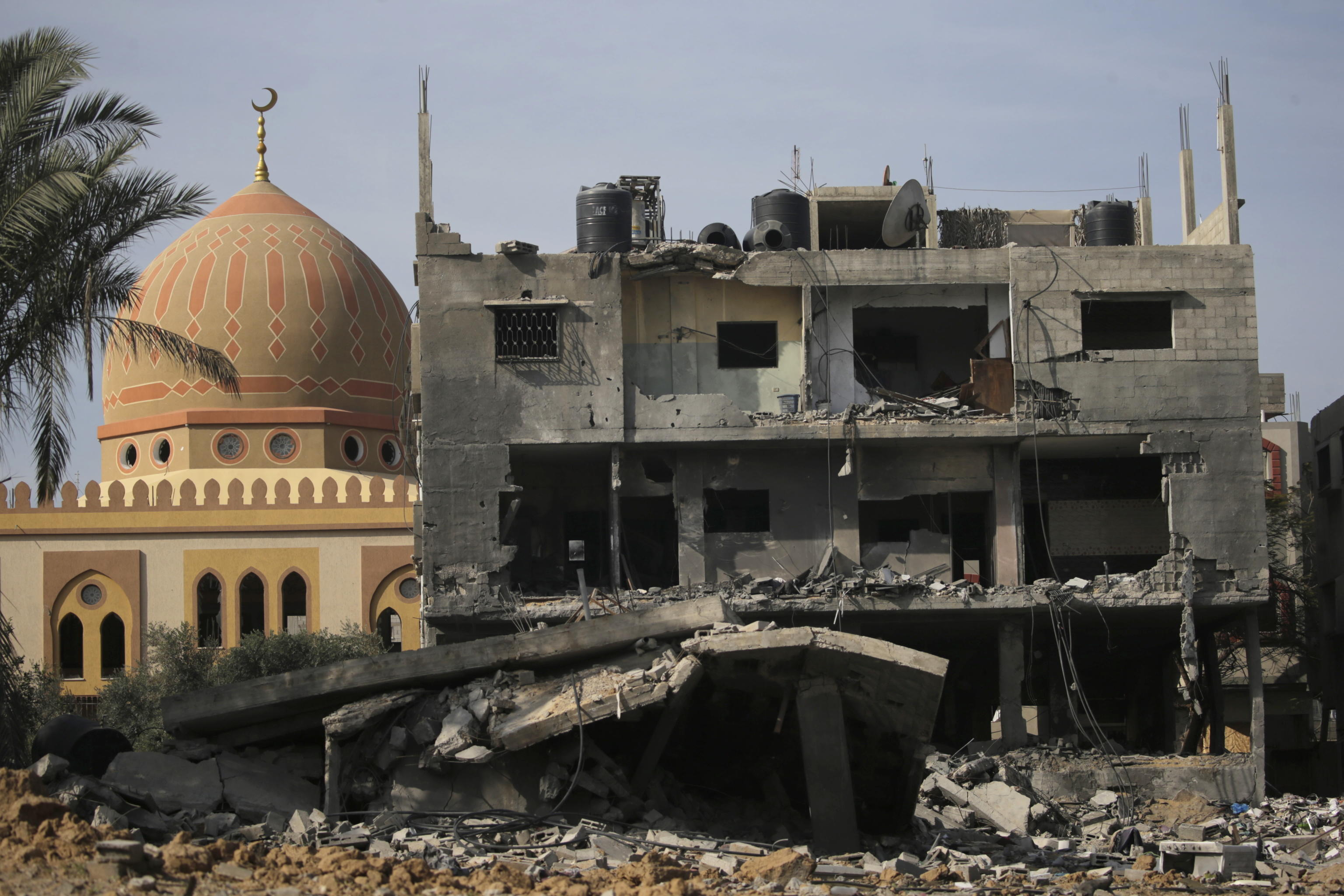 epa11038802 A view of a destroyed house following an Israeli air strike in Al Nusairat refugee camp, Gaza Strip, 20 December 2023. Israeli forces resumed military strikes on Gaza after a week-long truce expired on 01 December. More than 18,000 Palestinians and at least 1,200 Israelis have been killed, according to the Palestinian Health Ministry and the Israel Defense Forces (IDF), since Hamas militants launched an attack against Israel from the Gaza Strip on 07 October, and the Israeli operations in Gaza and the West Bank which followed it. Since 07 October, up to 1.9 million people, or more than 85 percent of the population, have been displaced throughout the Gaza Strip, some more than once, according to the United Nations Relief and Works Agency for Palestine Refugees in the Near East (UNRWA), which added that most civilians in Gaza are in 'desperate need of humanitarian assistance and protection'.  EPA/MOHAMMED SABER