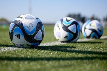 epa10543229 Official adidas UEFA EURO 2024 match balls lie on the pitch of play during a training session at the National Stadium, Ta' Qali, Malta, 25 March 2023. Italy will face Malta in the UEFA EURO 2024 Group C soccer match on 26 March 2023.  EPA/Domenic Aquilina
