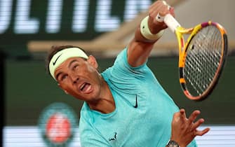 epa11373530 Rafael Nadal of Spain in action during his Men's Singles 1st round match against Alexander Zverev of Germany during the French Open Grand Slam tennis tournament at Roland Garros in Paris, France, 27 May 2024.  EPA/TERESA SUAREZ